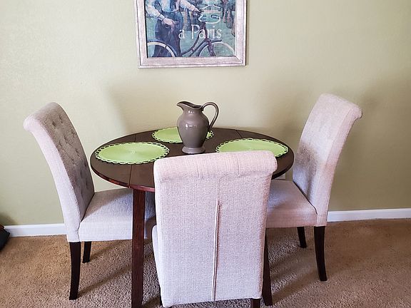 EXAMPLE ONLY. 
Dining area with sample furniture,