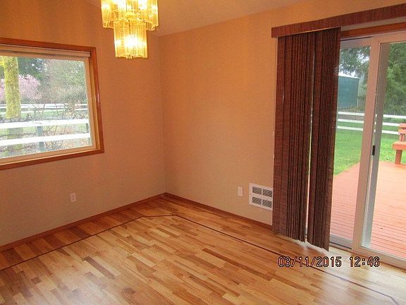 The spacious dining room also has newly refinished floors.
