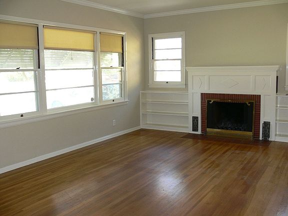 Gorgeous hardwood floors and built-in shelves