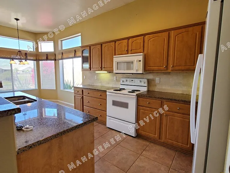 11558 W Tortoise Ct — Photo 17