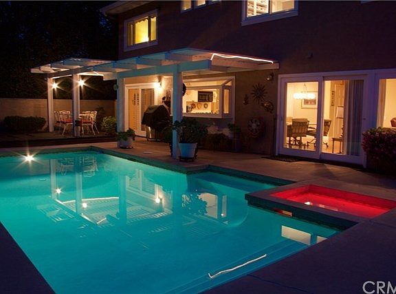 Smashing backyard with a glistening pool and spa, plus a gorgeous mountain view in the day!