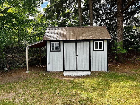 Back yard and storage shed.