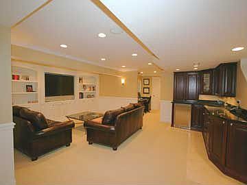 Basement family room with built-ins, surround sound, wet bar
