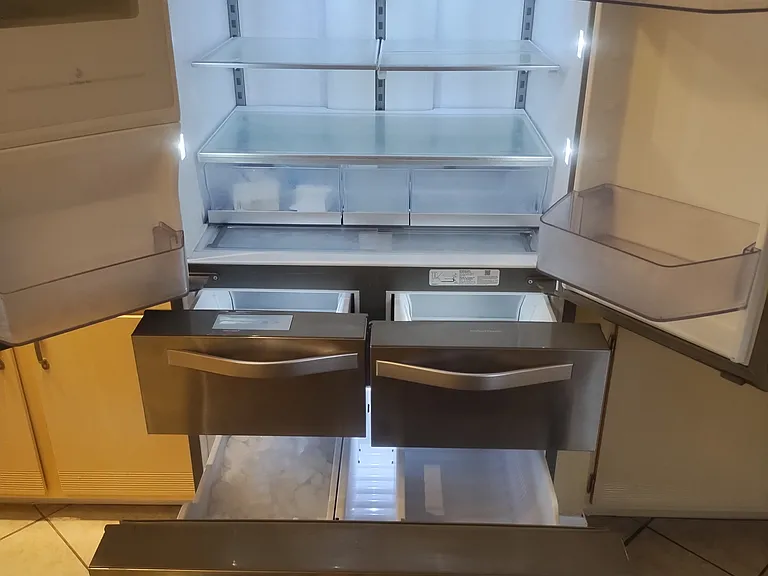 Inside of Refrigerator. Ice machine works.