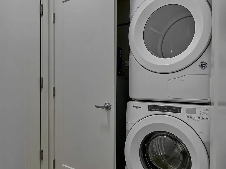 Experience convenience with this well-designed laundry space, perfect for modern living.