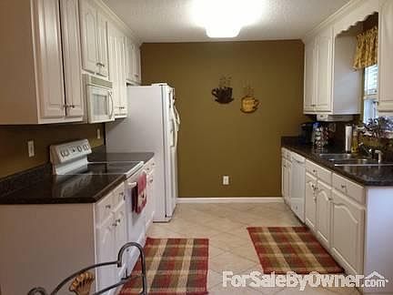 MORE PHOTOS @ WWW.UNIT202.INFO