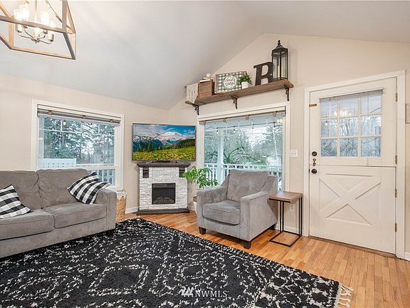 Living room at the main entry. Note the Dutch door!