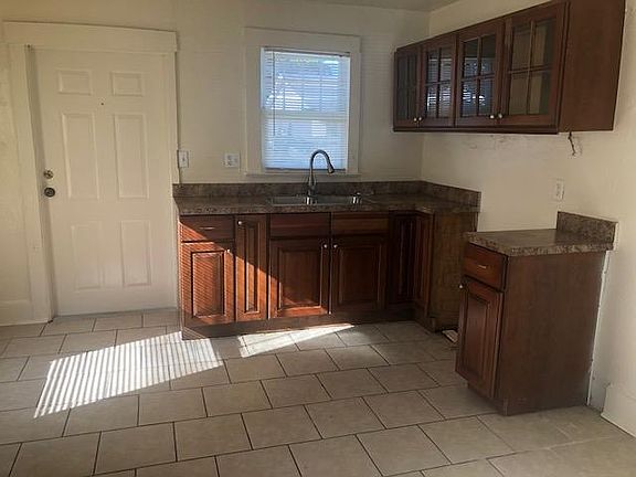 Kitchen with range and refrigerator to be included with rental.