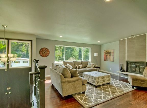 All new windows, paint, trim, lighting, floors and re-faced wood