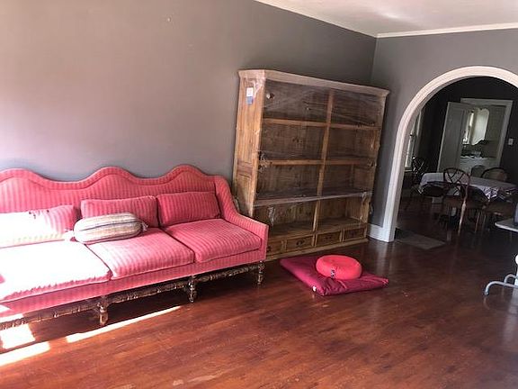 Front room with two windows looking out on Prescott Avenue