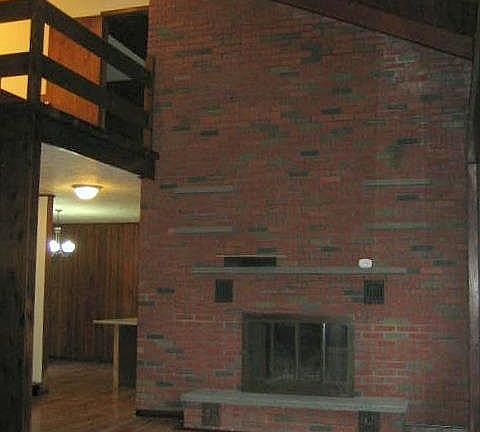 Fireplace & upstairs balcony