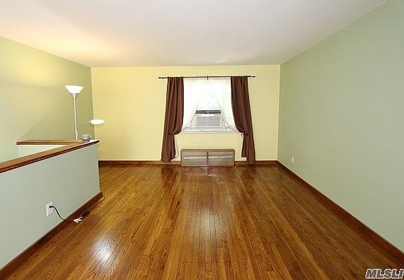 3rd image of 228-08 Stronghurst Ave #31-08