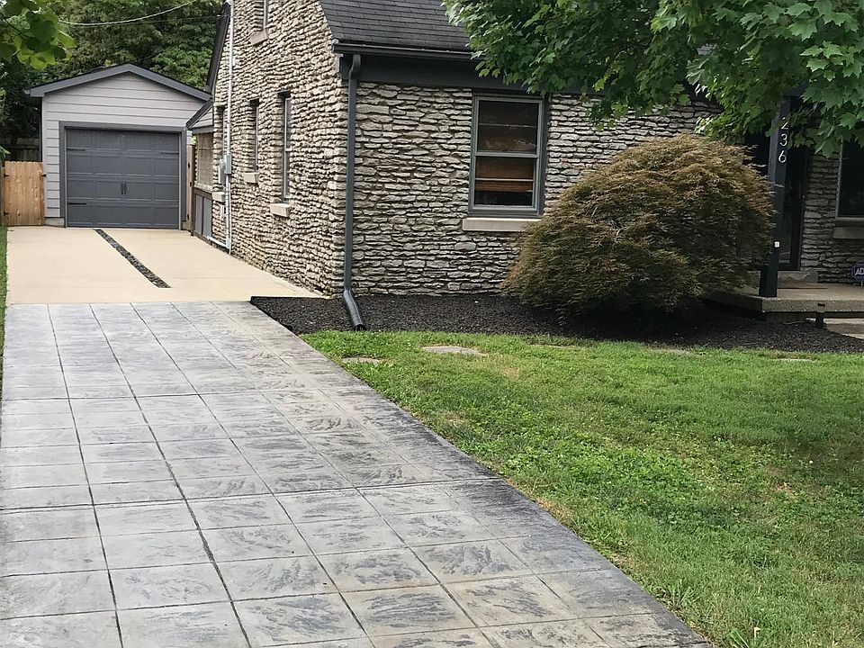 Left side of house and stamped concrete