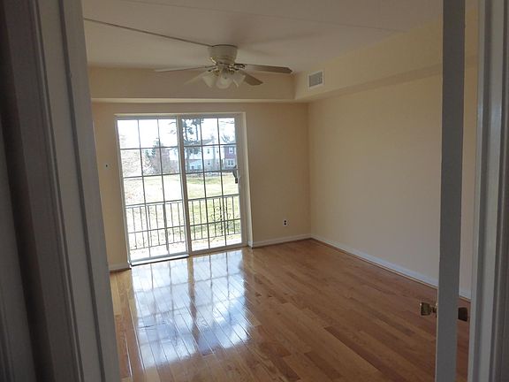 bedrooms to balcony, same on both floors ceiling fans