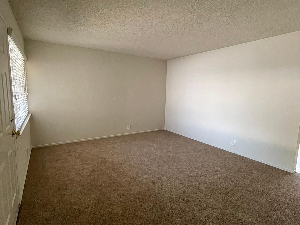 Spacious living room with lots of natural light.