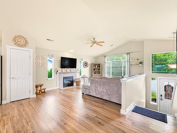 Step upstairs to the large living and dining area!>