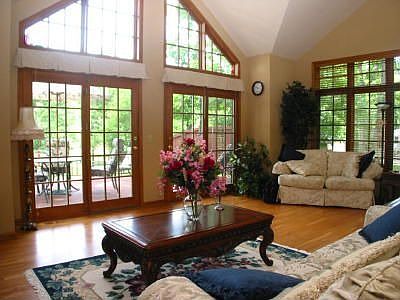Living Room with French Doors and Vaulted Ceilings