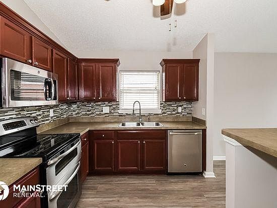 2nd image of 7405 International Village Dr #1