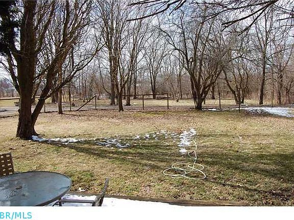 Large Treed Fenced In Back Yard