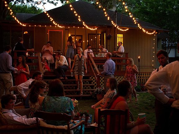 The deck, porches, & large backyard are PERFECT for hosting. There is so much room we've had a basketball hoop and fire pit set up for some years now. It's also shaded by an incredible oak tree.