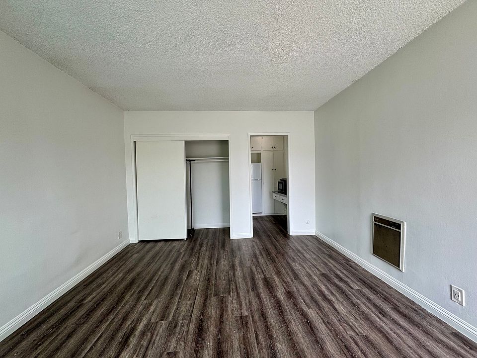 All photos are actual photographs of a comparable unit with a similar floor plan and finish style, shown for reference only.