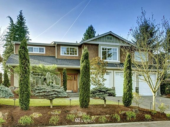 Well designed landscape, artificial grass in the front yard, automated sprinkler system.