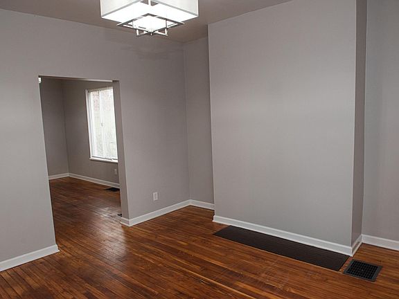 Front living room leading into large family/dining room