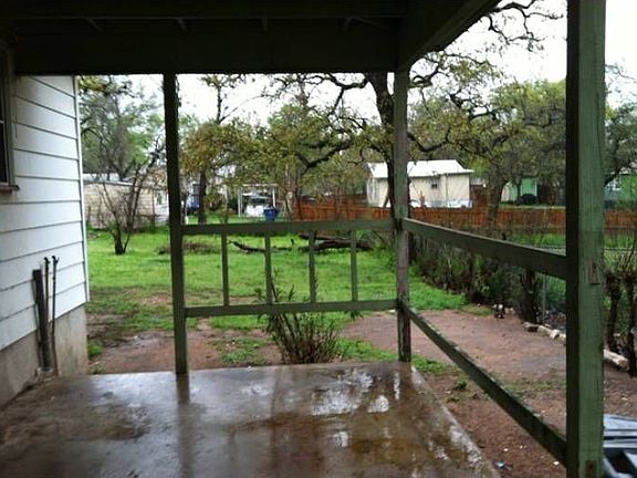 carport and backyard