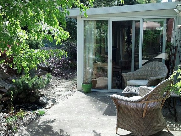 sunroom with pond