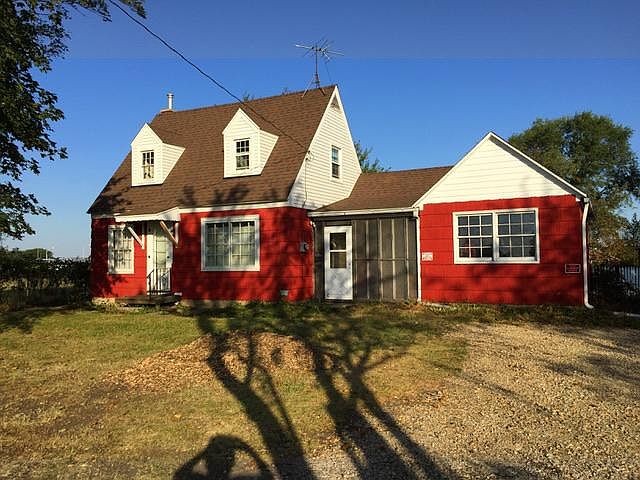 Farm-style gabled house in a country setting yet near Rochelle.