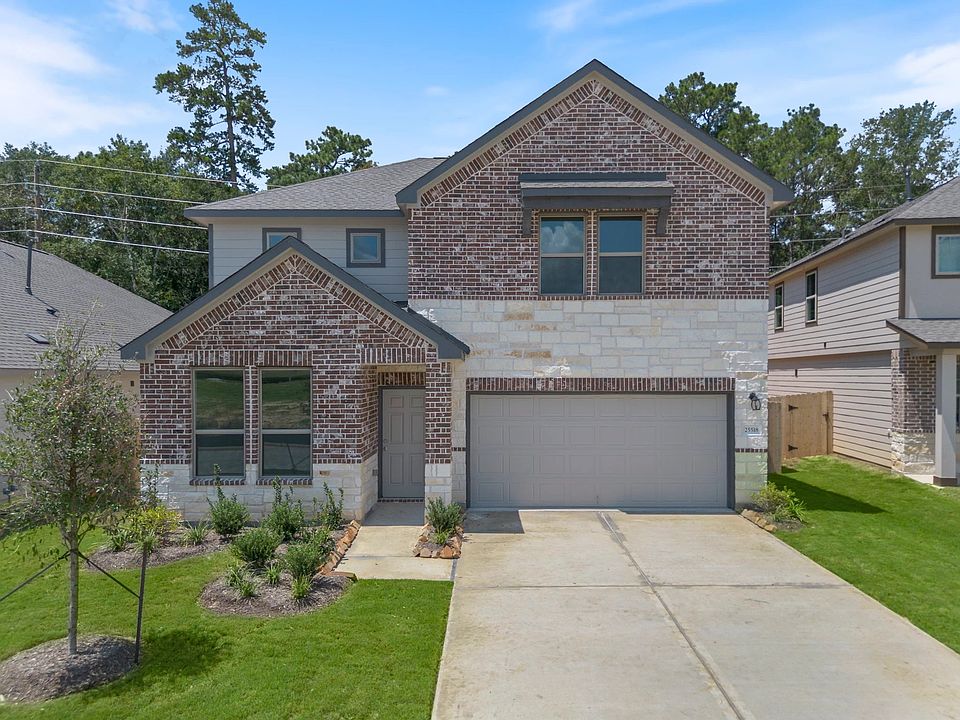 Welcome home to 25518 West Blackwater Creek Trail located in the community of Spring Creek Trails an