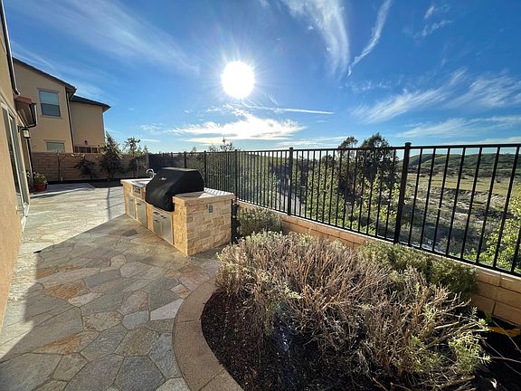 Backyard view of bbq grill, looking towards Irvine.