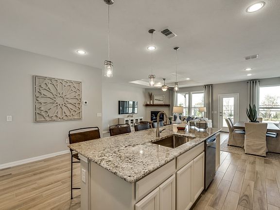 Pendant lighting over large island
