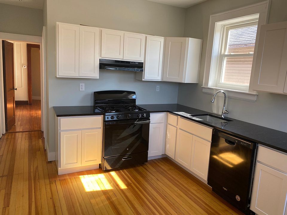 Newly renovated kitchen with brand new stove and dishwasher