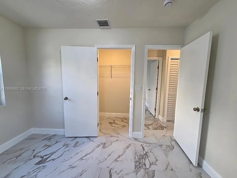 295 NW 48th St — Photo 12