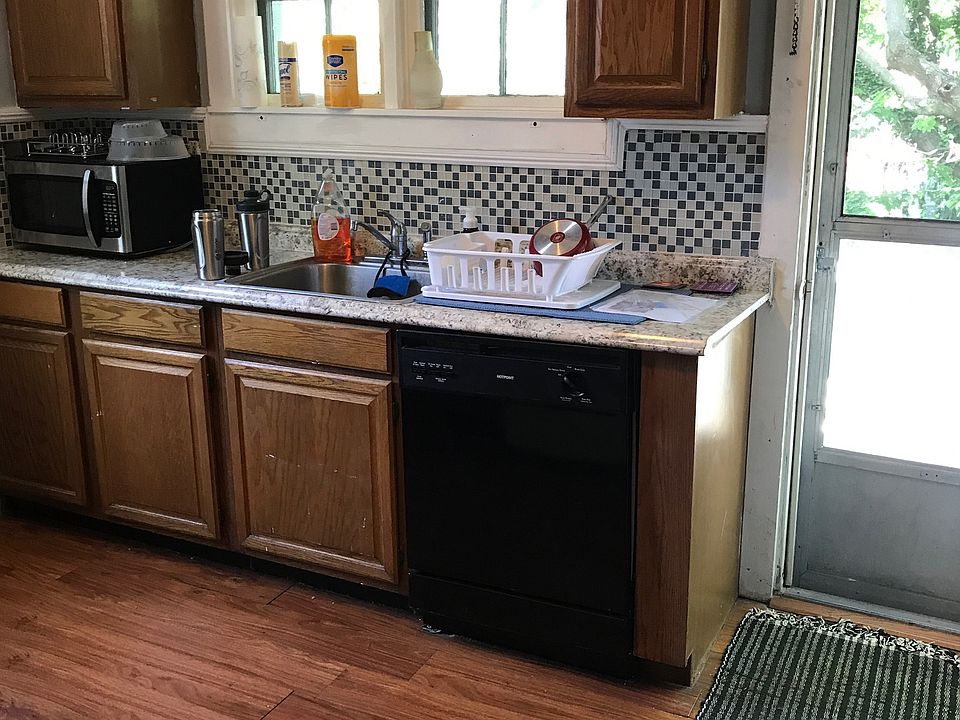 Kitchen opens to private patio.