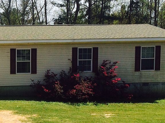 shutters match red plant