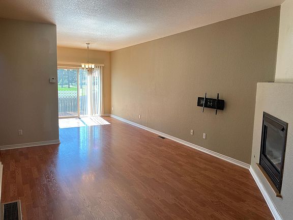Main floor living room w/ fireplace