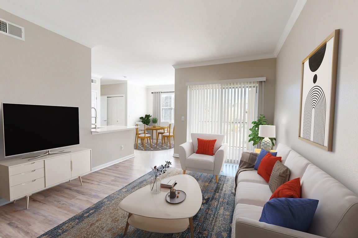 Newly Renovated Living Room with Hardwood-Style Flooring