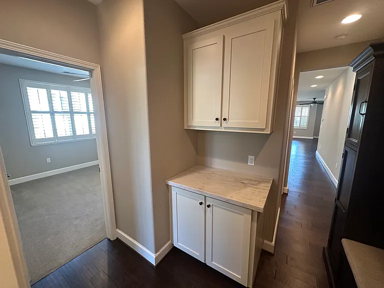 Hallway connecting bedroom 2 & 3 to family room, kitchen and dinning room