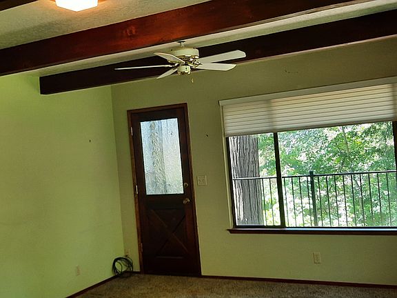 Bedroom - is being painted white. Door to private deck.