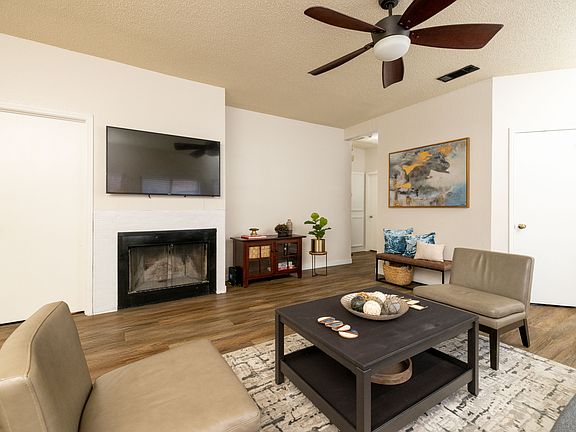 Living room- Large smart TV with fireplace