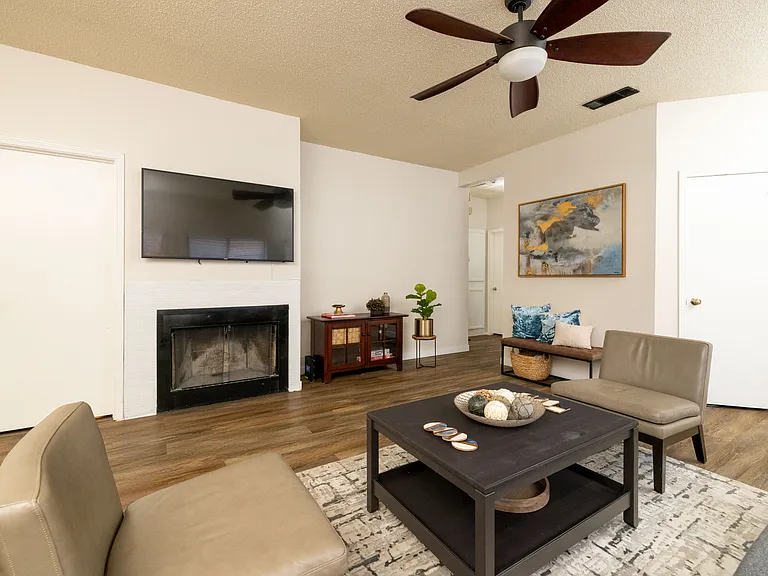 Living room- Large smart TV with fireplace