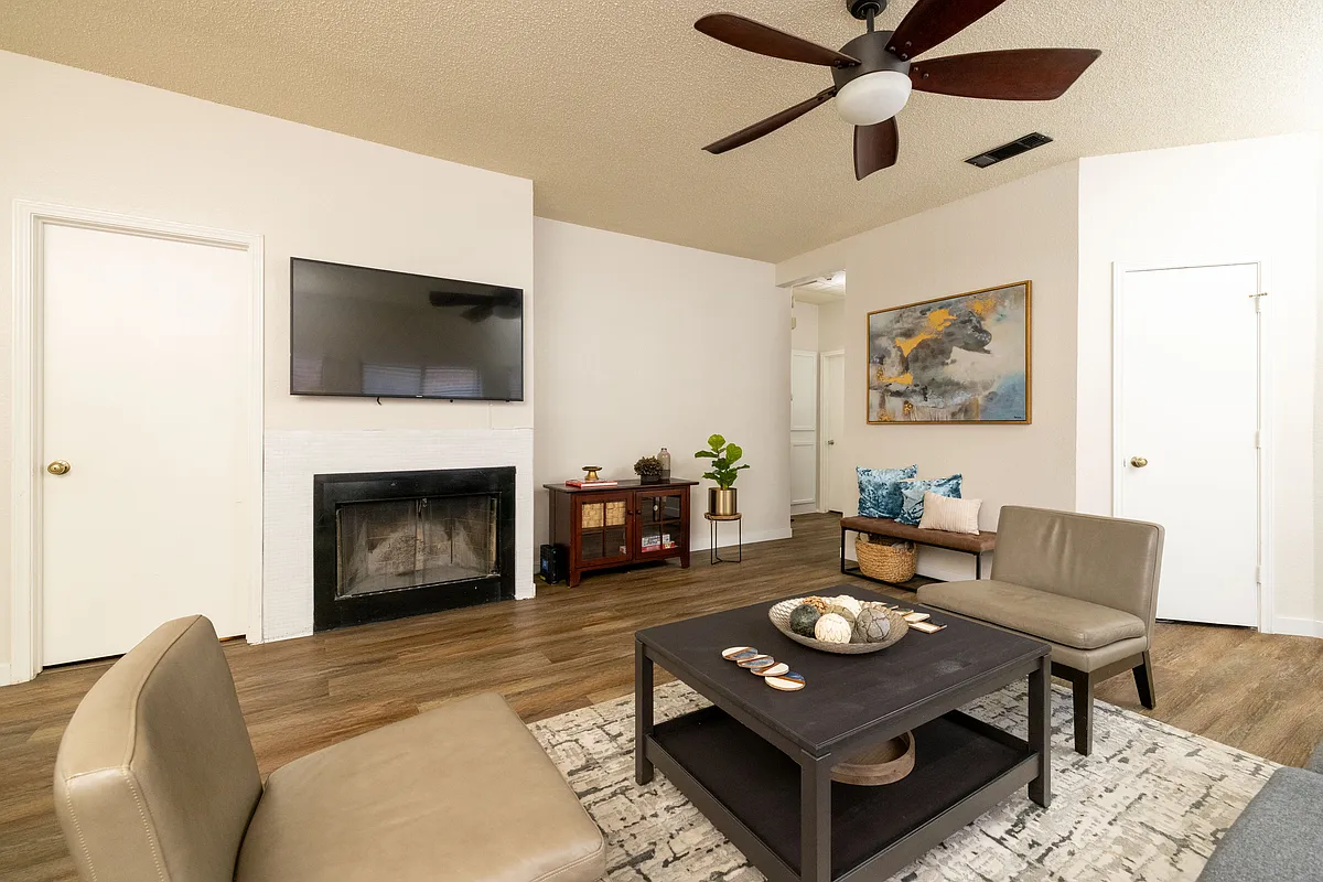 Living room- Large smart TV with fireplace - 2926 Roxboro Rd