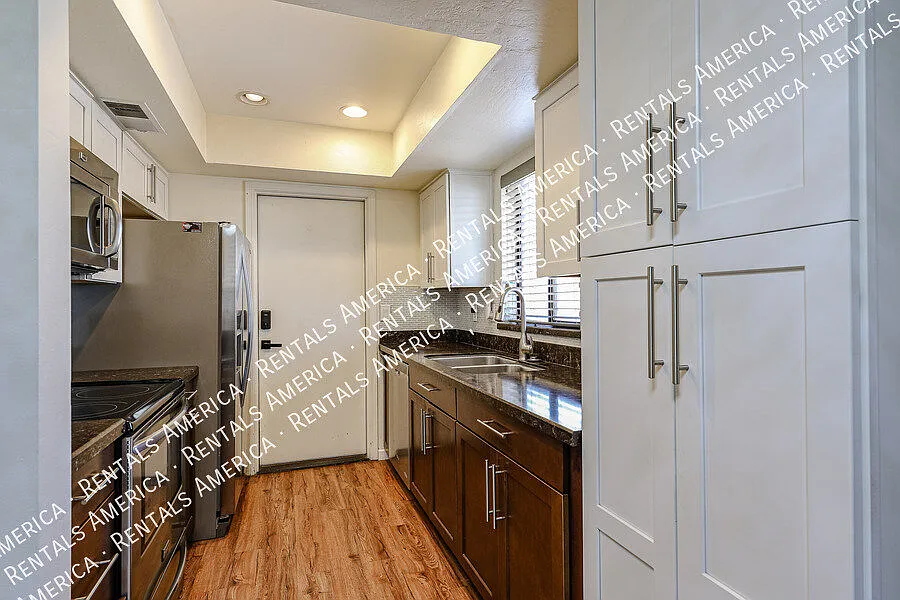 Move-In Ready! 2-Bedroom Condo with Private Backyard — Photo 3