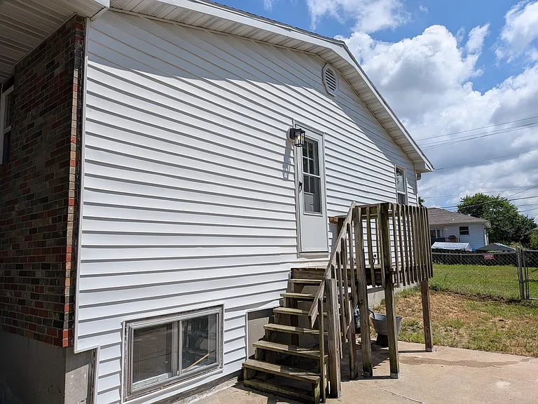 Side entrance/exit from kitchen, basement bonus room window