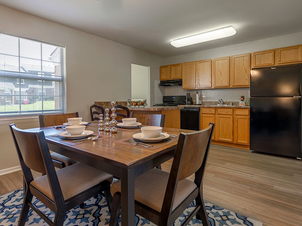 Solid Wood Cabinets & Black Appliances