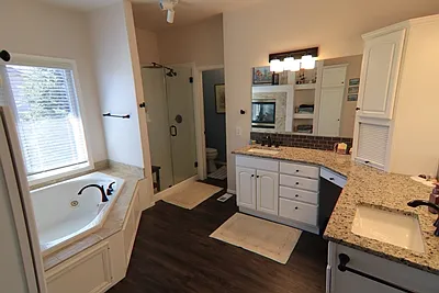 Primary Bathroom. Whirlpool jet Tub, separate shower and separate toilet room. Walk in closet entry is in bathroom