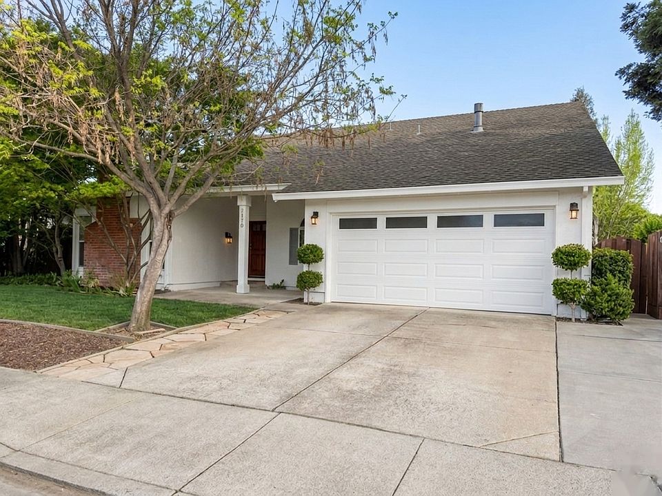 Welcome to 2170 Cimarron Drive, quiet cul-de-sac, mature trees, 2-car garage