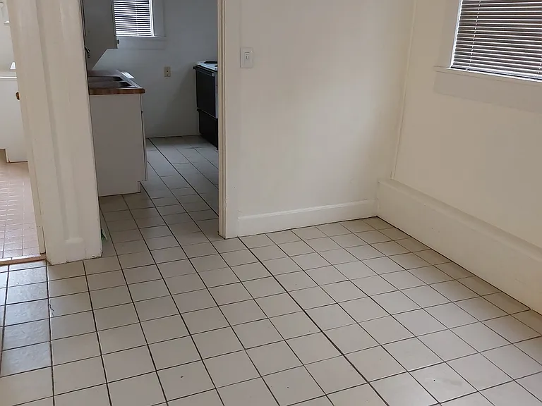 doorway from dining area into kitchen